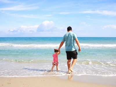 Fathers Day with dad and daughter on a beach