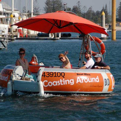 round self drive boat leaving Mariners Cove